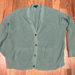 J Crew cardigan in pale green.  Excellent condition. 85% cotton and 15% cashmere